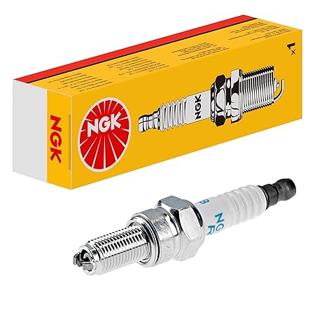 NGK spark plug and packaging on a white background