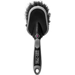 Black and gray brush with bristle head on a white background