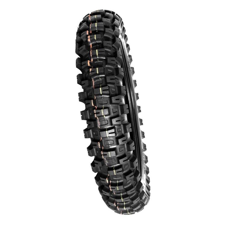 Off-road tire with prominent tread pattern on a white background