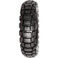 Motorcycle tire with prominent tread pattern on a white background