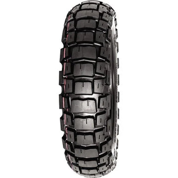 Motorcycle tire with prominent tread pattern on a white background