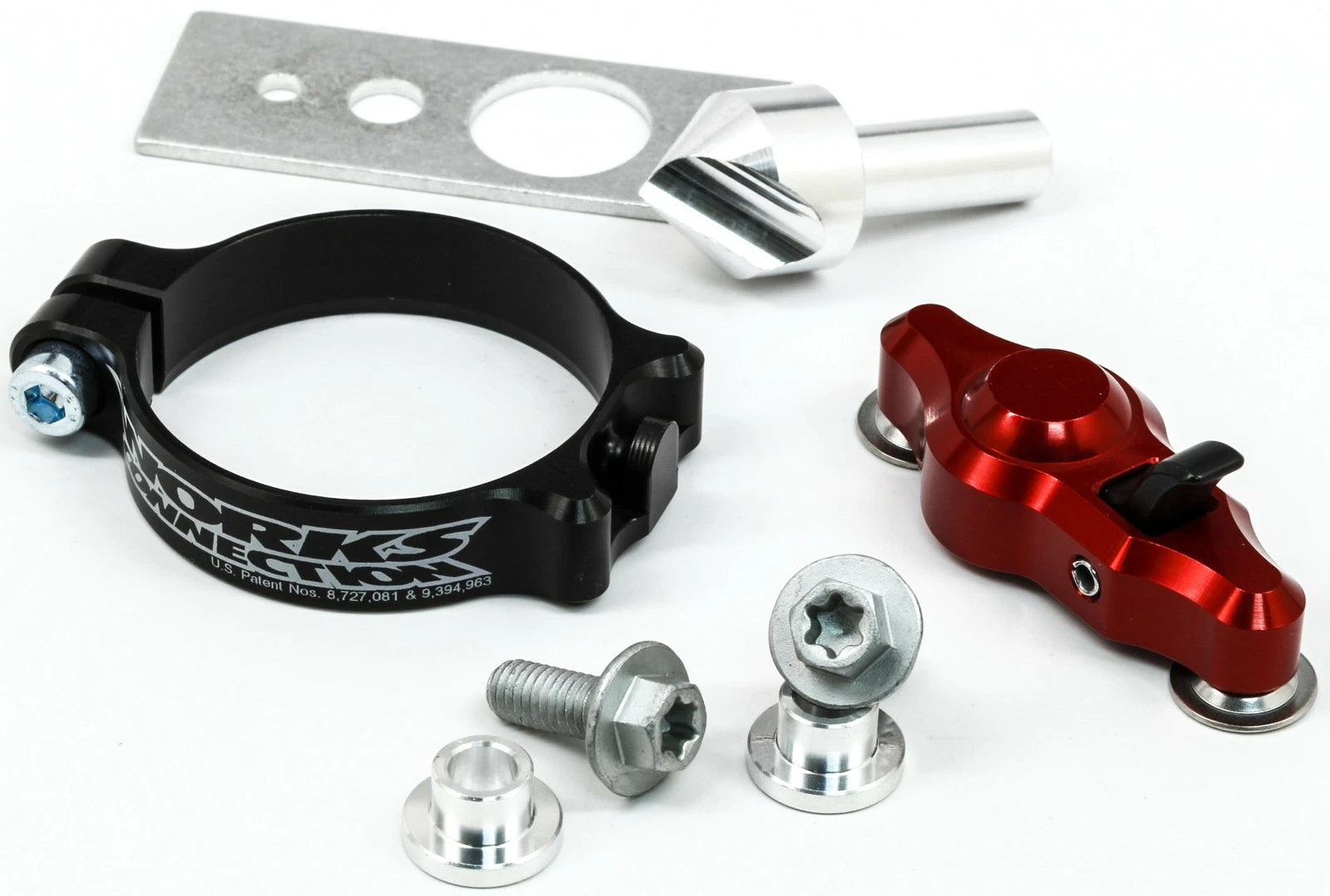 Mechanical parts including a black clamp, red component, and silver bolts on a white background