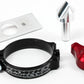 Mechanical parts including a black clamp, red component, and metal plate on a white background