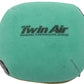 Green air filter with 'Twin Air' branding on a white background